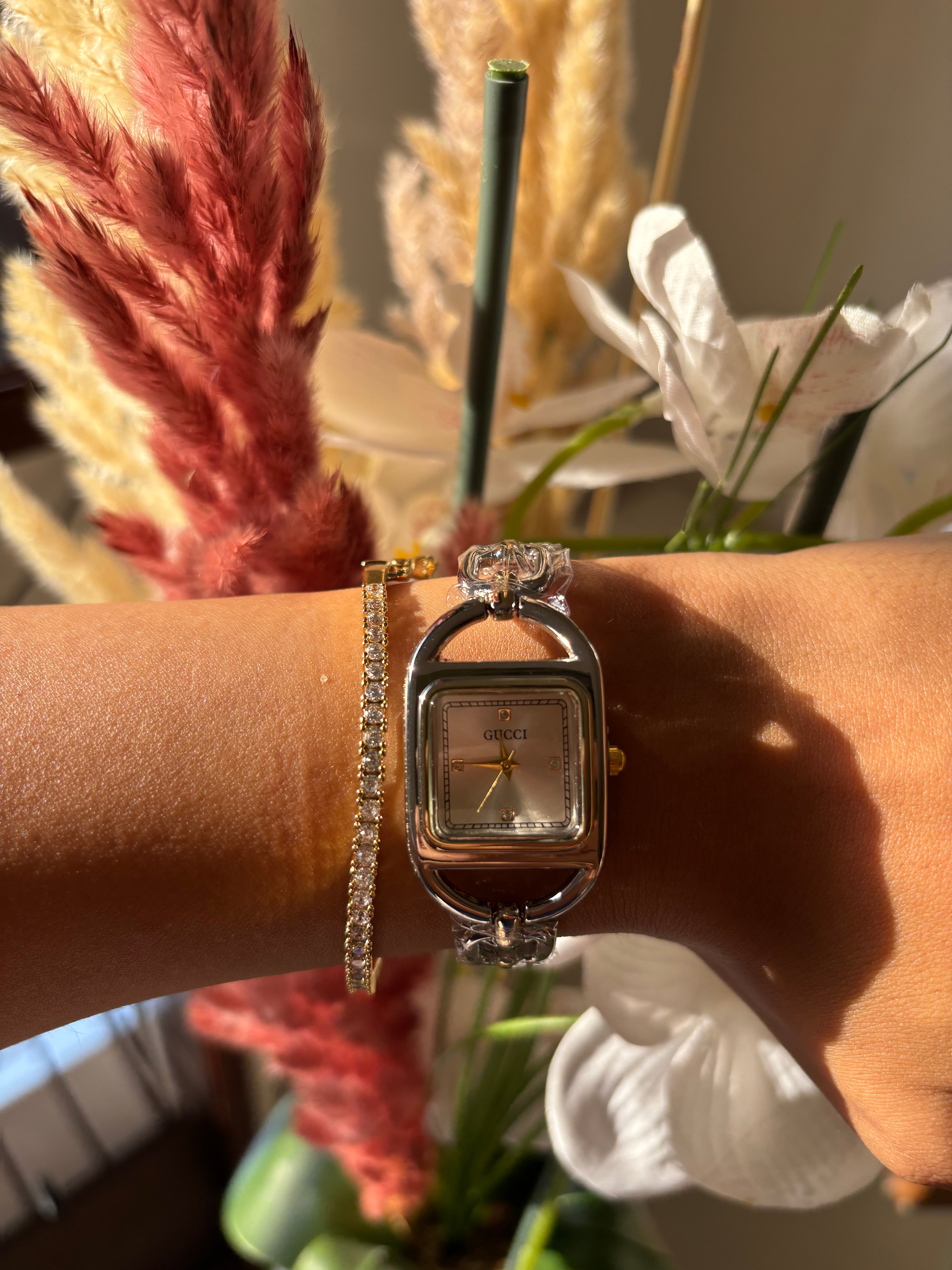 Montre Gucci chaîne argentée